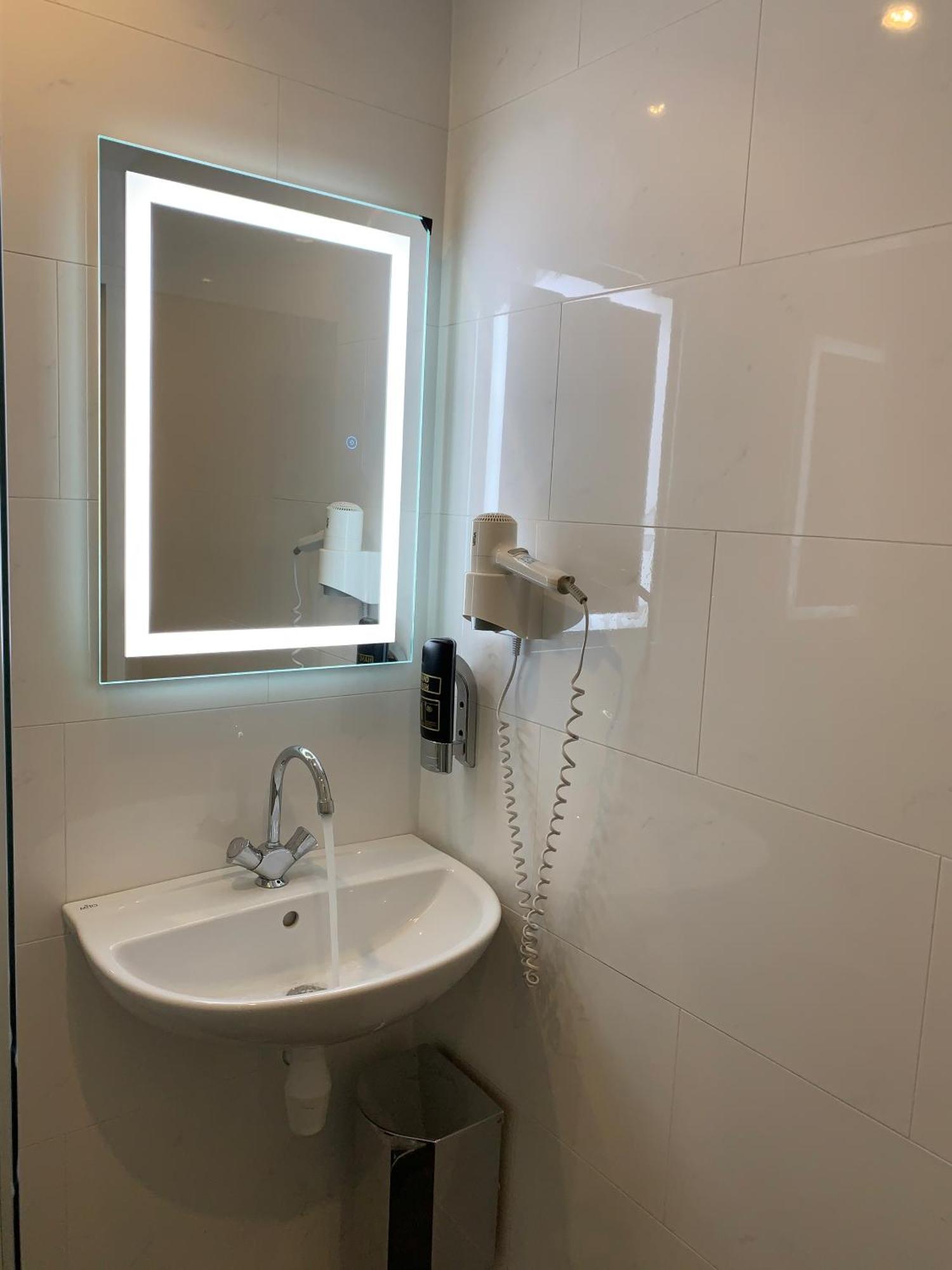 Dam Hotel Амстердам Екстериор снимка